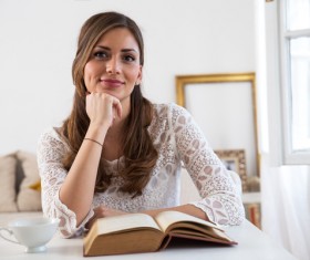 Smiling woman with book Stock Photo