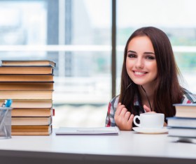 Smiling young female student and book HD picture