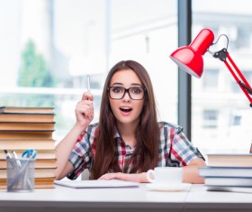 Surprised young female student and book HD picture