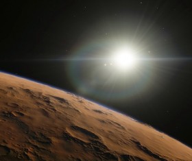 The barren planet and the sun Stock Photo
