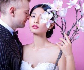 Wedding photographs of newlyweds and flowers Stock Photo