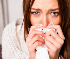 Woman resting on the beach Stock Photo