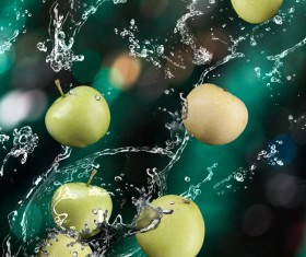 Apples and splashing water Stock Photo