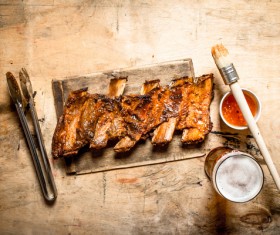 Barbecue pork ribs with tomato sauce and beer HD picture
