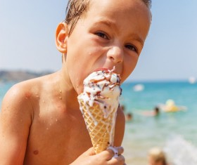 Beach children who eat ice cream Stock Photo 02