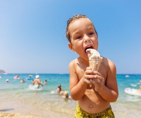 Beach children who eat ice cream Stock Photo 04