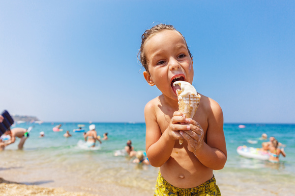 Beach children who eat ice cream Stock Photo 04