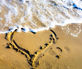 Beach heart-shaped Stock Photo