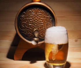 Beer bucket with a glass of beer Stock Photo