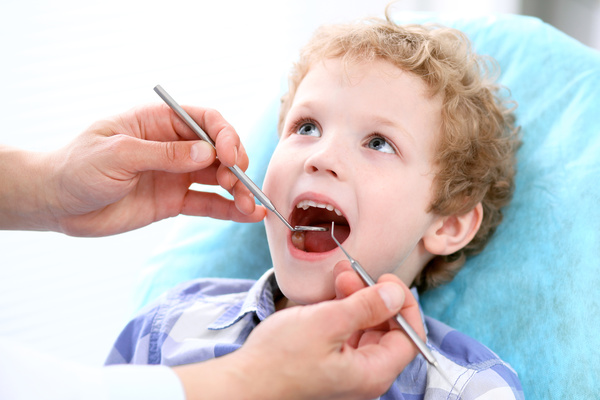 Check the teeth of the child Stock Photo