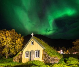Churches and midnight aurora