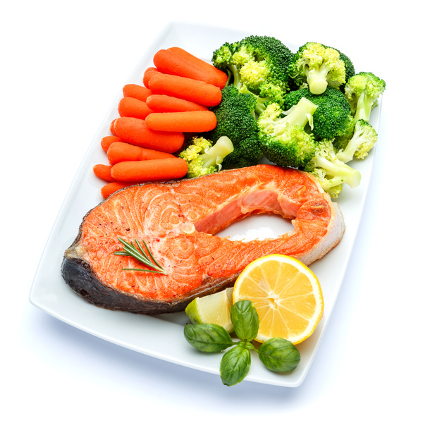Grilled salmon with a mix of vegetables Stock Photo