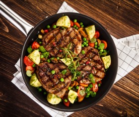 Grilled steak baked potatoes and vegetables Stock Photo 02