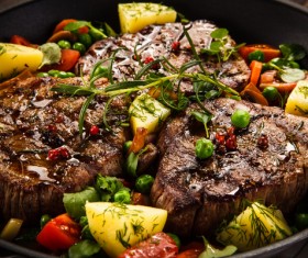 Grilled steak baked potatoes and vegetables Stock Photo 03