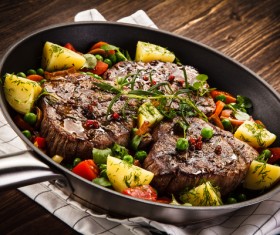 Grilled steak baked potatoes and vegetables Stock Photo 04