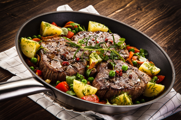 Grilled steak baked potatoes and vegetables Stock Photo 04