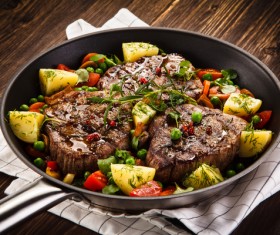 Grilled steak baked potatoes and vegetables Stock Photo 05