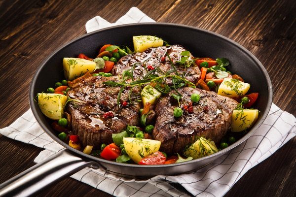 Grilled steak baked potatoes and vegetables Stock Photo 05