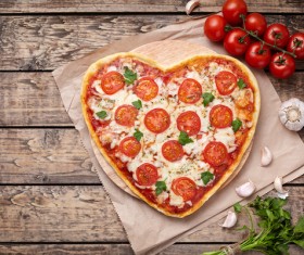 Heart pizza with vegetables Stock Photo