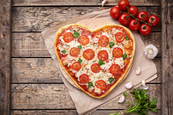 Heart pizza with vegetables Stock Photo