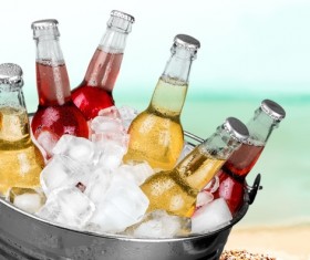 Ice cubes and beer in buckets Stock Photo