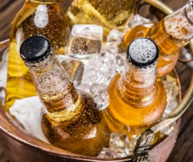 Ice cubes and beer in buckets Stock Photo 02