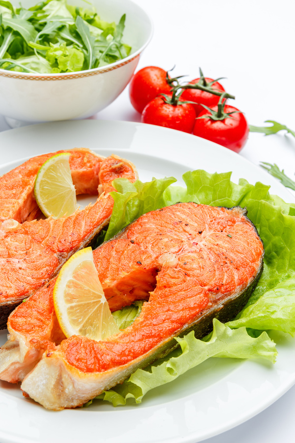 Lemon grilled salmon with vegetables Stock Photo