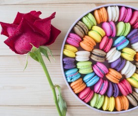 Macaron in the box with flowers Stock Photo
