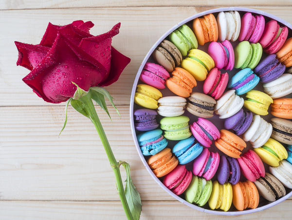 Macaron in the box with flowers Stock Photo