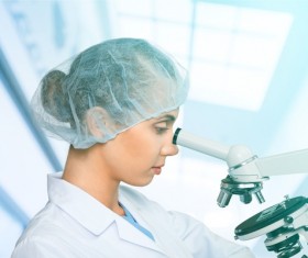 Medical laboratory woman working with A microscope 02