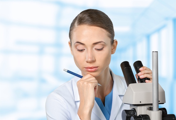 Medical laboratory woman working with A microscope 04