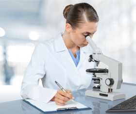 Medical laboratory woman working with A microscope 06