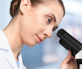 Medical laboratory woman working with A microscope 07