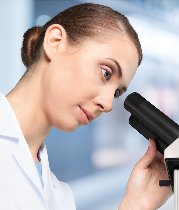 Medical laboratory woman working with A microscope 07
