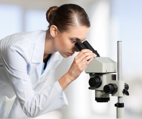 Medical laboratory woman working with A microscope 09