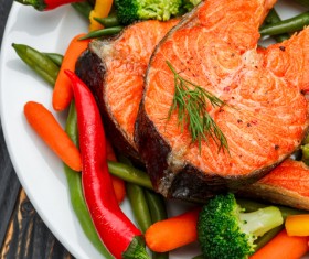 Pepper with beans and grilled salmon Stock Photo