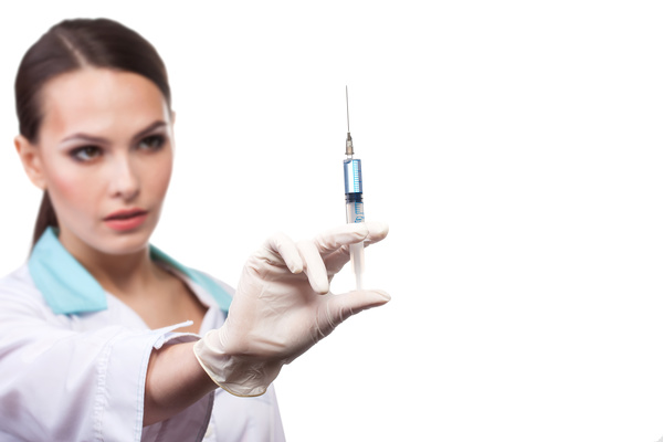 Ready to inject female doctor Stock Photo
