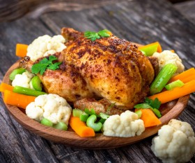 Sauce with fried chicken and blue flowers Stock Photo