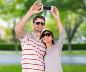 Self-timer of the couple Stock Photo