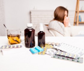Sick woman with desktop medicine Stock Photo 04