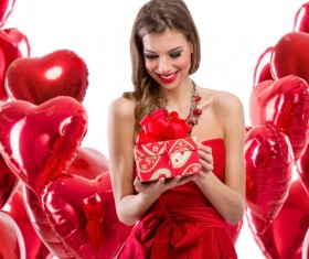 Smiling girl with a Valentines gift HD picture 08