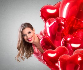 Smiling girl with a Valentines gift HD picture 10