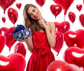 Smiling girl with a Valentines gift HD picture 16