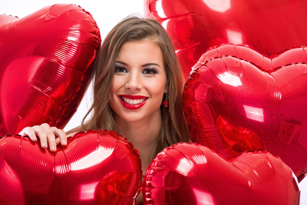 Smiling girl with a Valentines gift HD picture 17