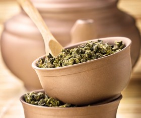 Tea in the teacup with teapot Stock Photo