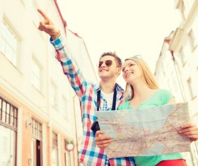 Tourists and city maps Stock Photo