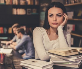 Young people in the library Stock Photo 03