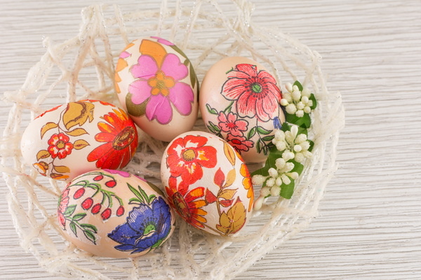 Baskets decorated eggs of different flowers Stock Photo