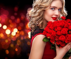 Beautiful blonde woman holding bouquet of red roses HD picture 01