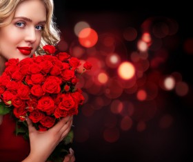 Beautiful blonde woman holding bouquet of red roses HD picture 02